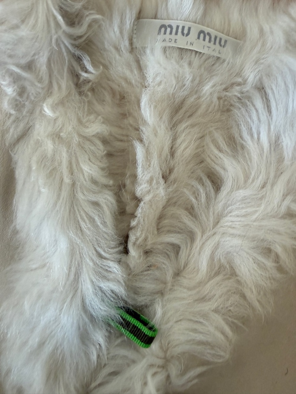 Miu Miu 1999 shearling vest grosgrain strap buckles